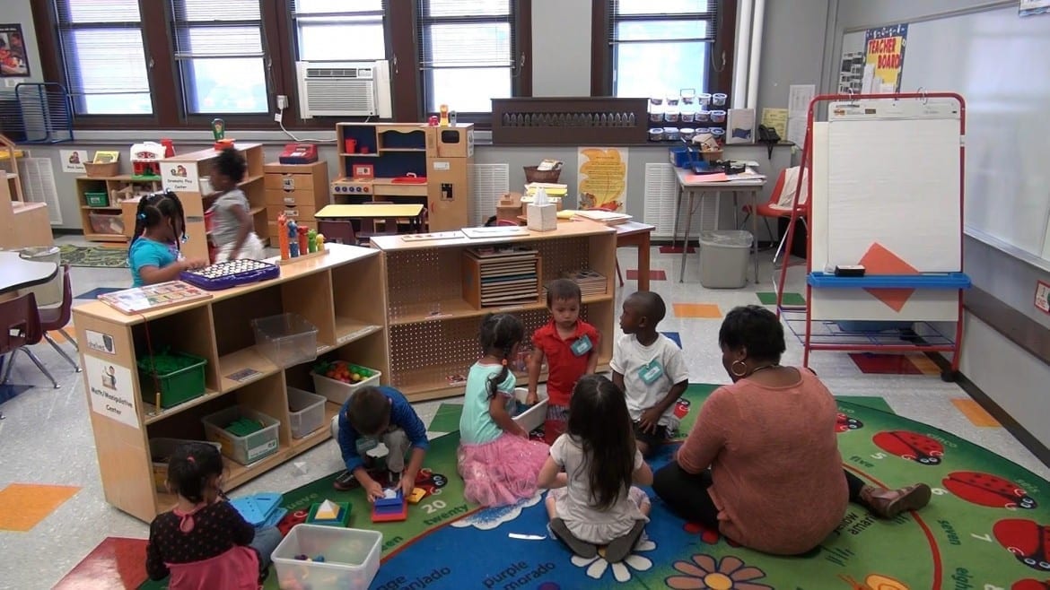 Head Start students at Woodland Early Learning Center in Kansas City, Missouri, interact in their classroom. (Photo: Mike Sherry | Heartland Health Monitor)
