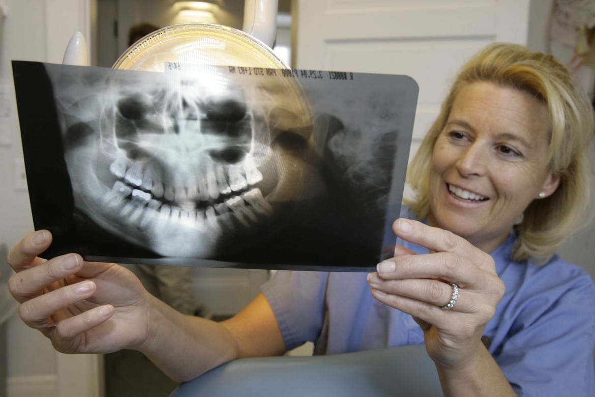 dentist with x-ray