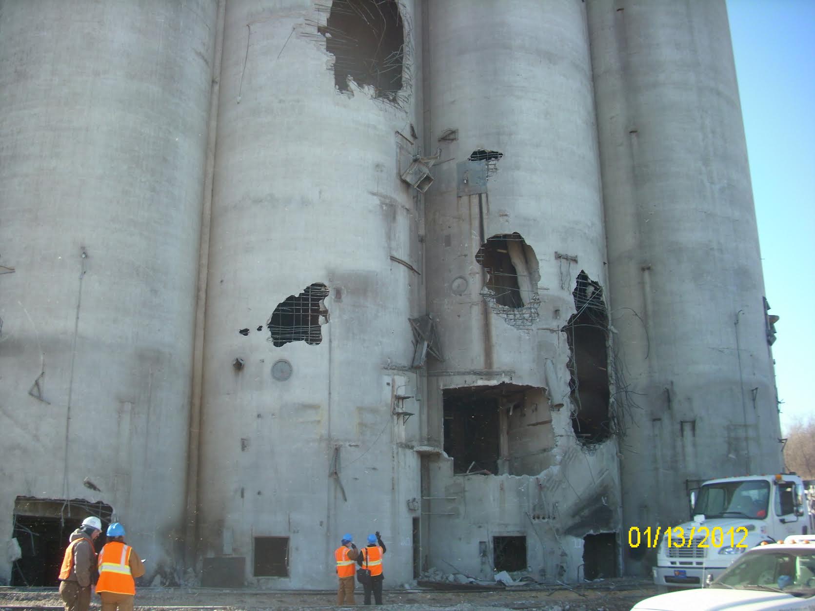 A corn elevator showing explosion holes