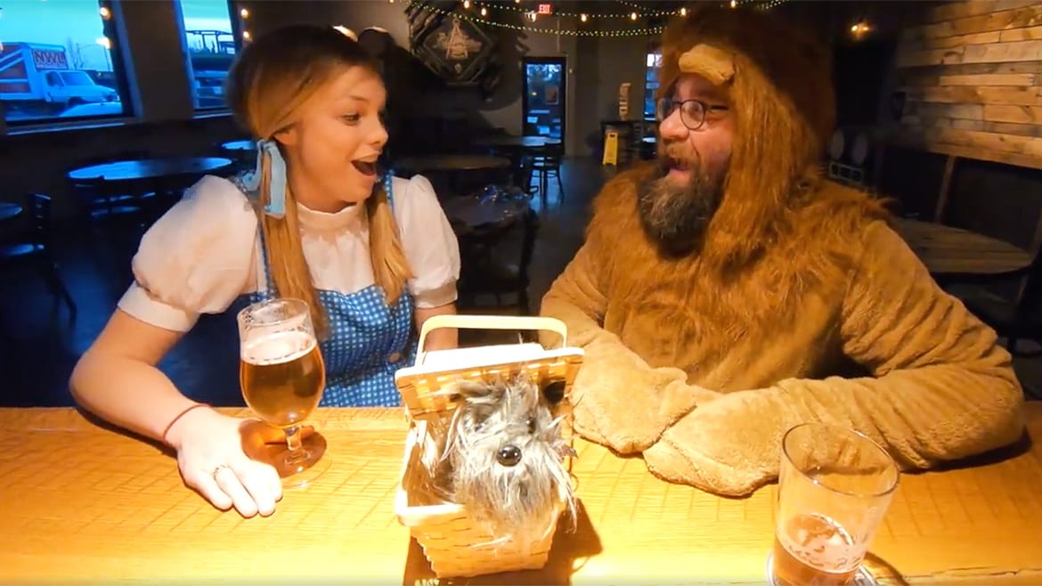 Head brewer Brian “Bucky” Buckingham (right) and brewery representative Melissa Simon pose as the lion and Dorothy from “The Wizard of Oz,” 