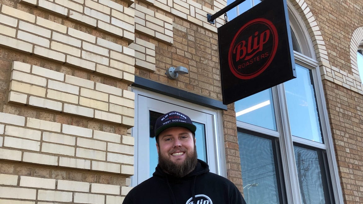 Ian Davis in front of the newly opened Blip Roasters Troost Avenue.