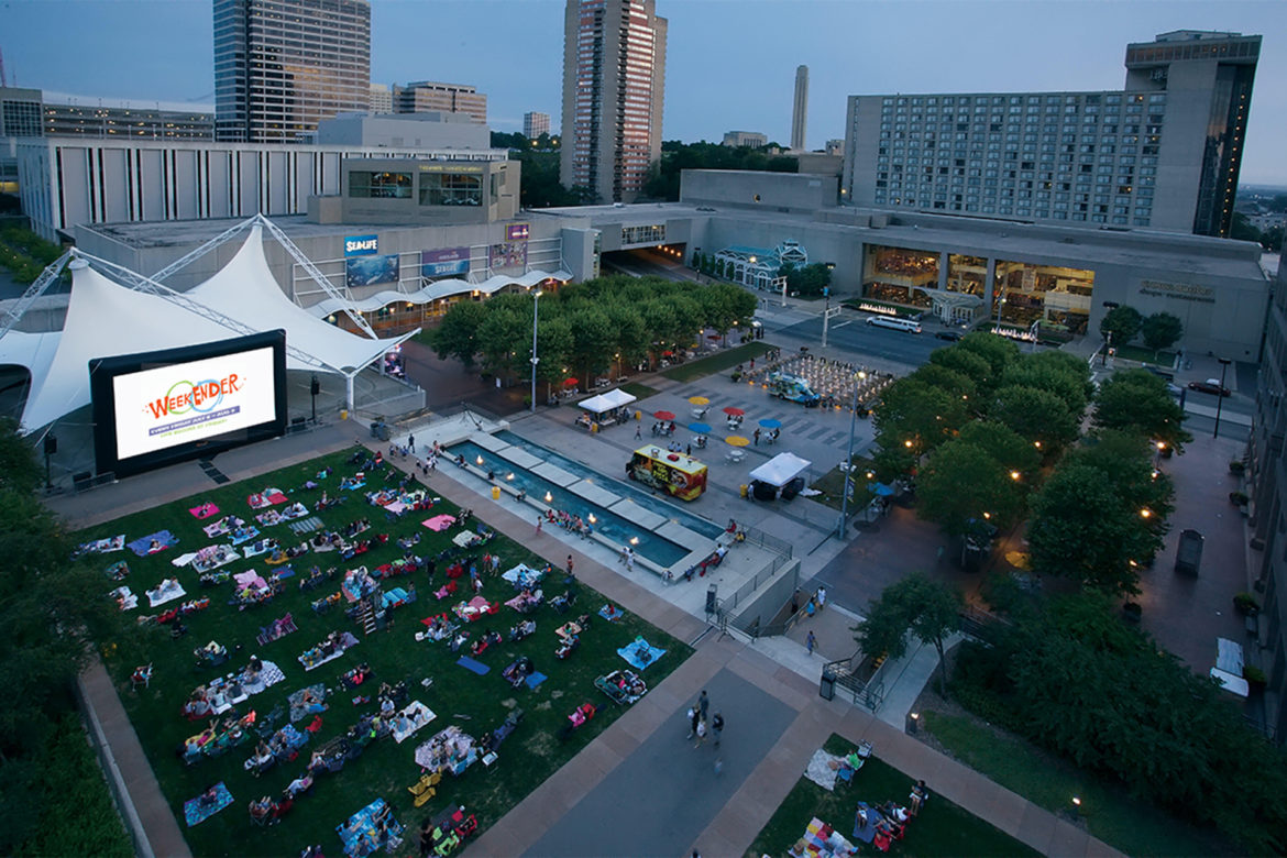 Families gather at Crown Center's WeekEnder Series to watch a show.