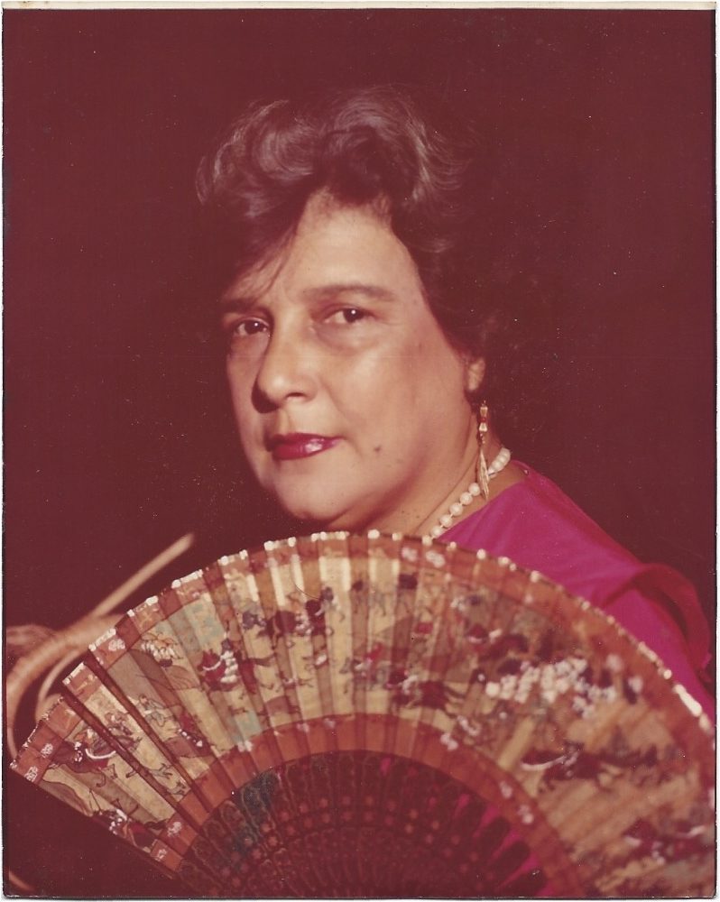 Portrait of women with a fan