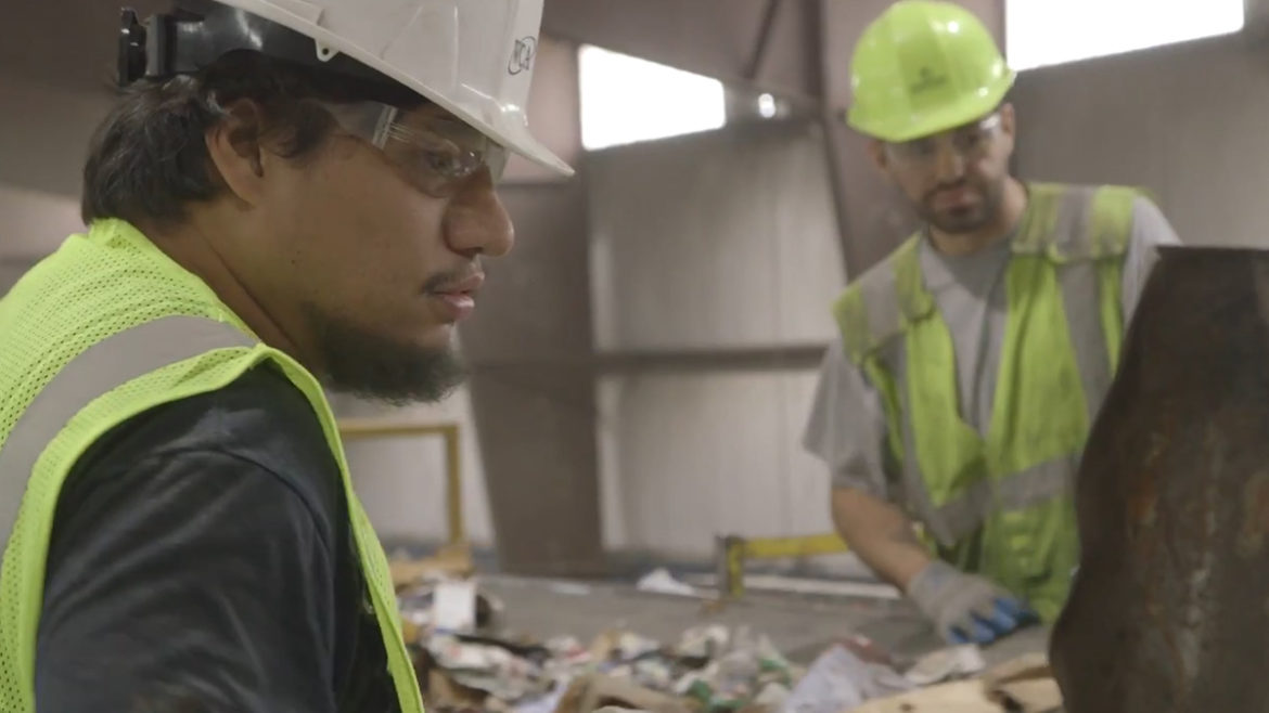 Workers at recycling facility