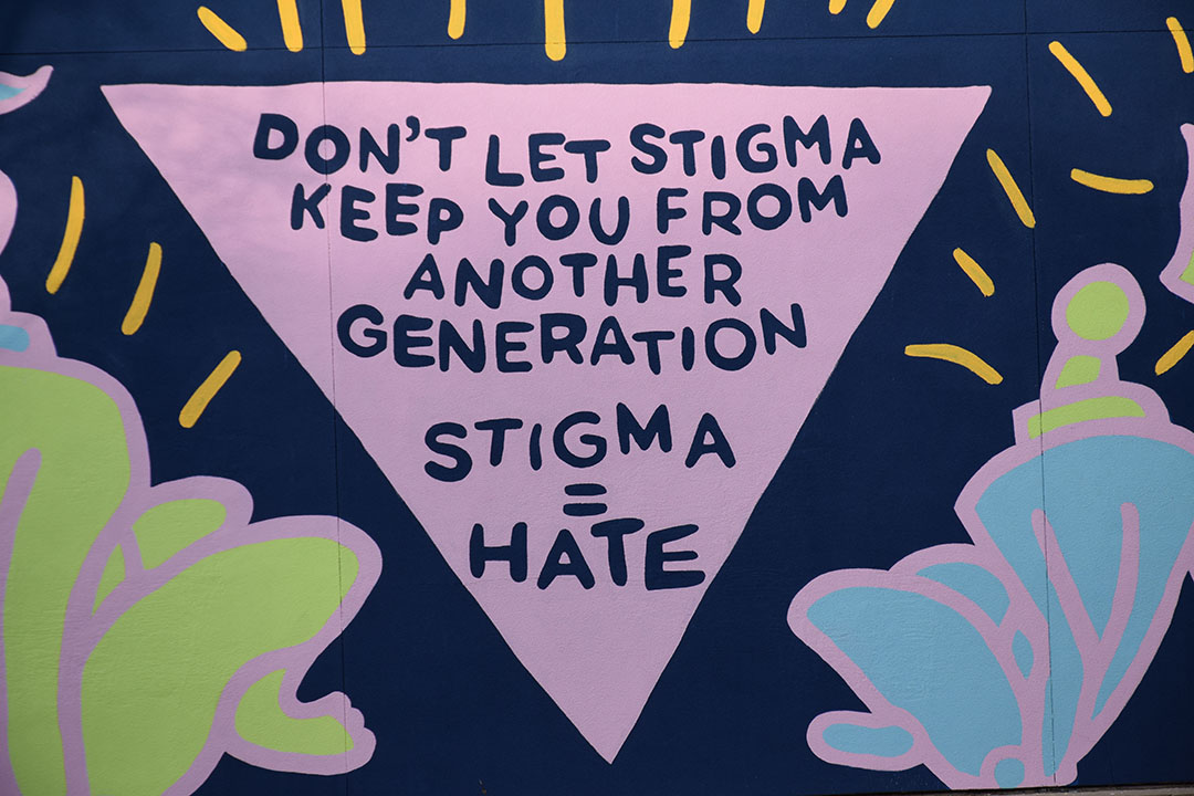 The 2020 World AIDS Day Mural. Text reads Don't Let Stigma Keep You From Another Generation Stigma=Hate