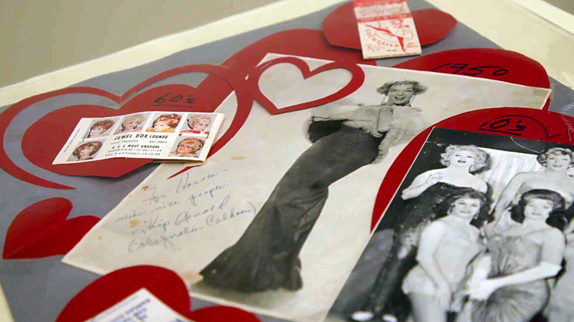 A smattering of photos, pamphlets and cut-out paper hearts frame images of "female impersonators" of the 1950s. This is part of the GLAMA Archives collection. Image by Cody Boston