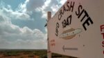 Tour sign for an alleged UFO crash site near Rosewell, New Mexico.