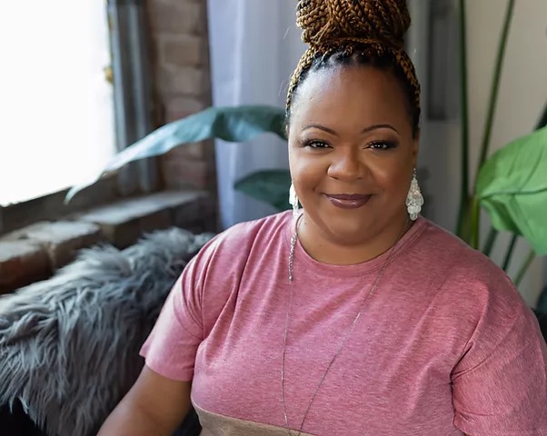 Tamicka Monson, in a pink shirt with her hair in a bun full of braids, smiles. She shared her story of being diagnosed with three sleep disorders. Today, she's a licensed counselor. (Contributed)