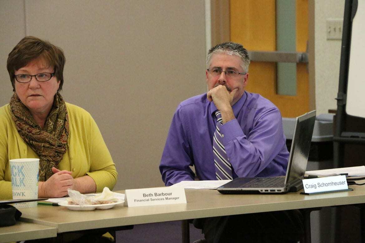 Budget officials at the center answer questions