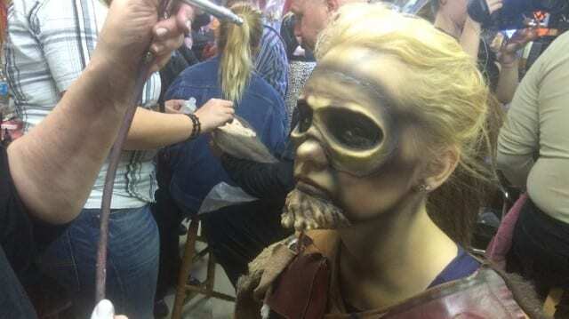 "Screamsters," like this woman pictured, spend 15–25 minutes in the makeup chair before spending around six hours scaring park guests. (photo by Caitlin Cress/Hale Center for Journalism)