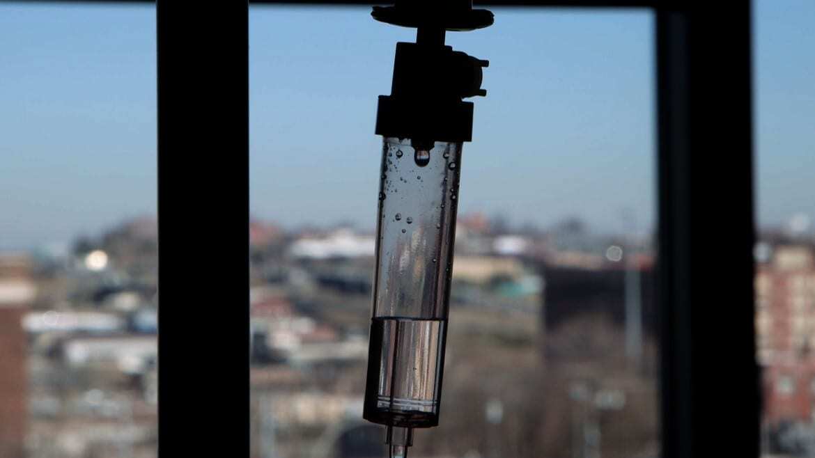 Image of an IV with saline at a KC hospital.