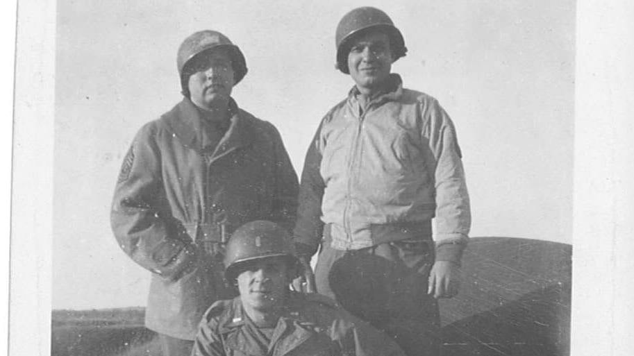 1st Sgt. William McGraw, left, and two friends, somewhere in France, 1945. "Sarge" was father to reporter Mike McGraw, who would inherit the war-time letters between his parents. (Credit: McGraw family)