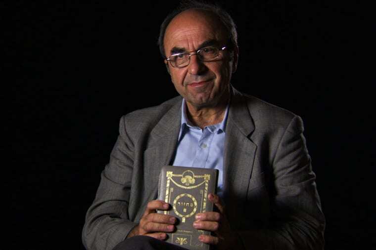 Rexhep Hoxha from 'Besa: The Promise.' holding Hebrew prayerbook