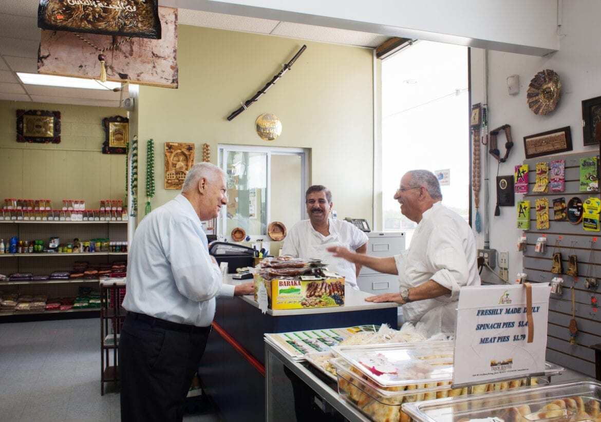 People in a butcher shop