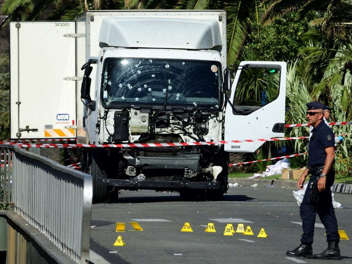 A truck with bullet holes.