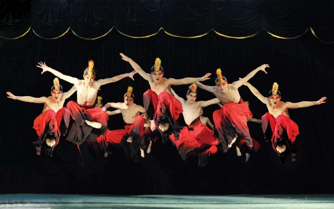 Acrobats jumping.