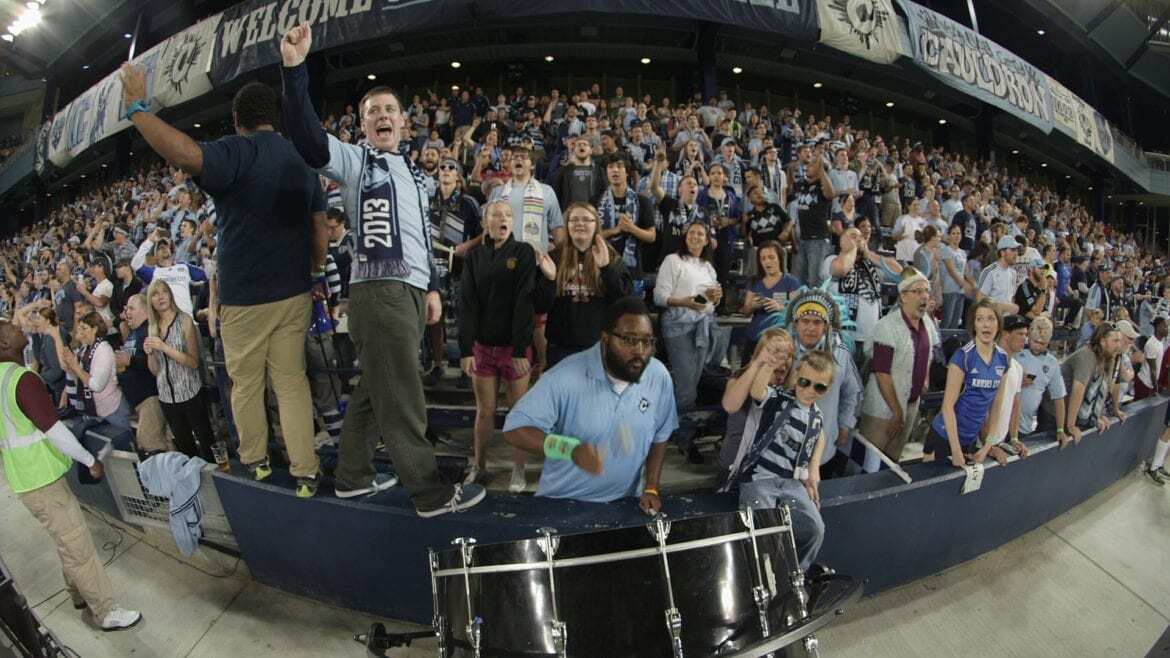 A group of soccer fans chanting