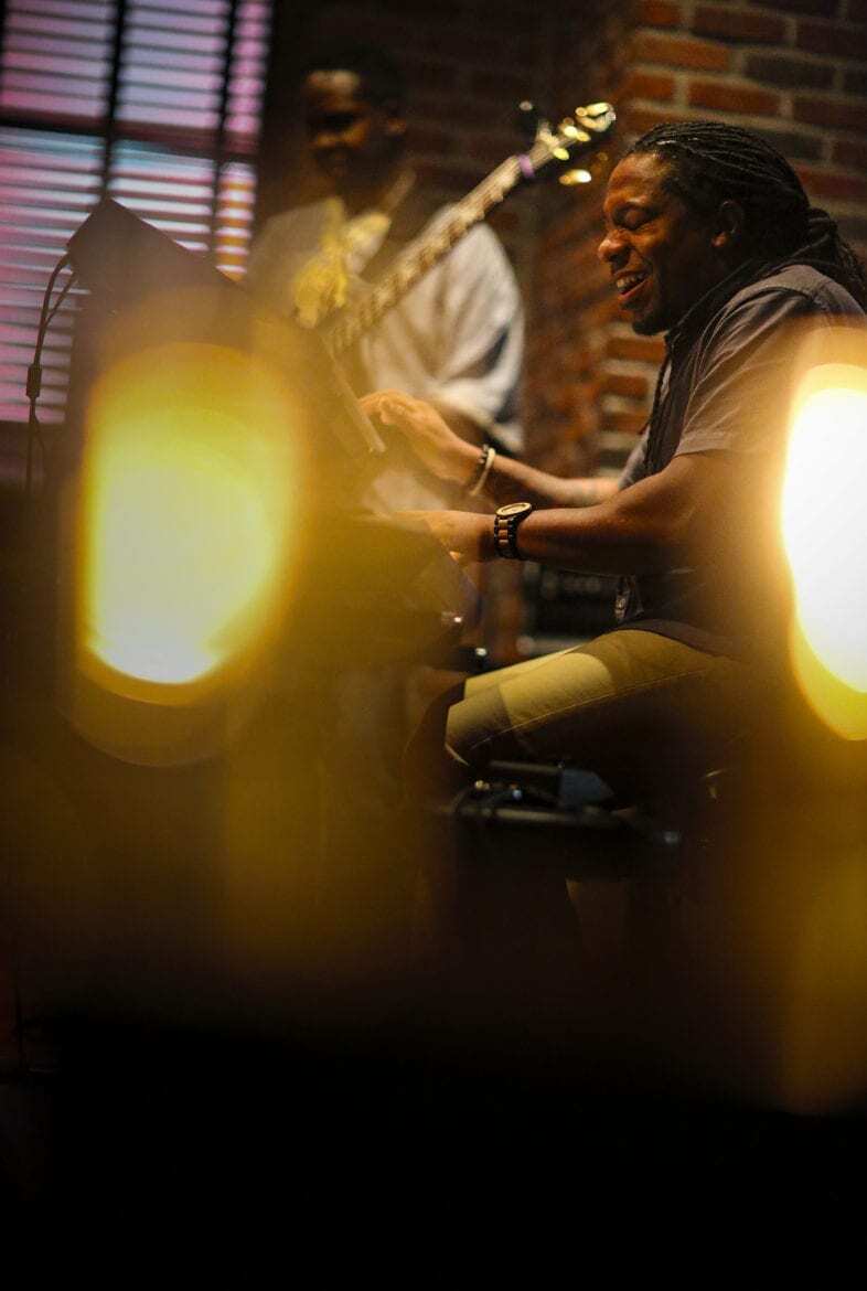 A man playing in a band.