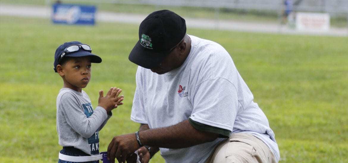 Pastor Roberson with child