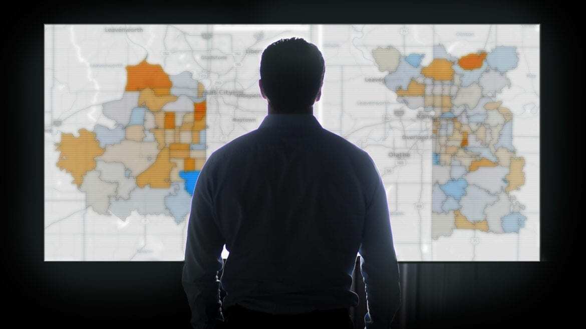 Research intern Ryan Hennessy works on a data visualization that came from information he collected over 44 days in the Wyandotte County Courthouse.