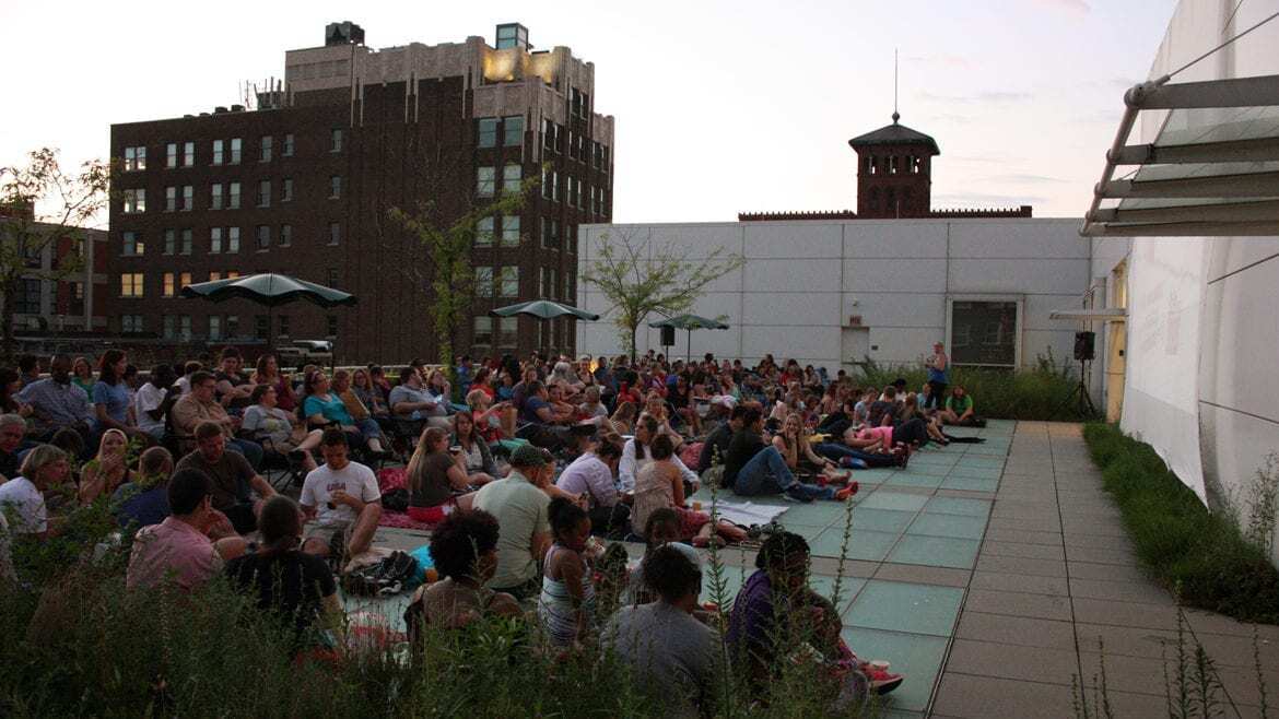 Movie-goers on top of Kansas City Public Library downtown central library for Off the Wall film festival