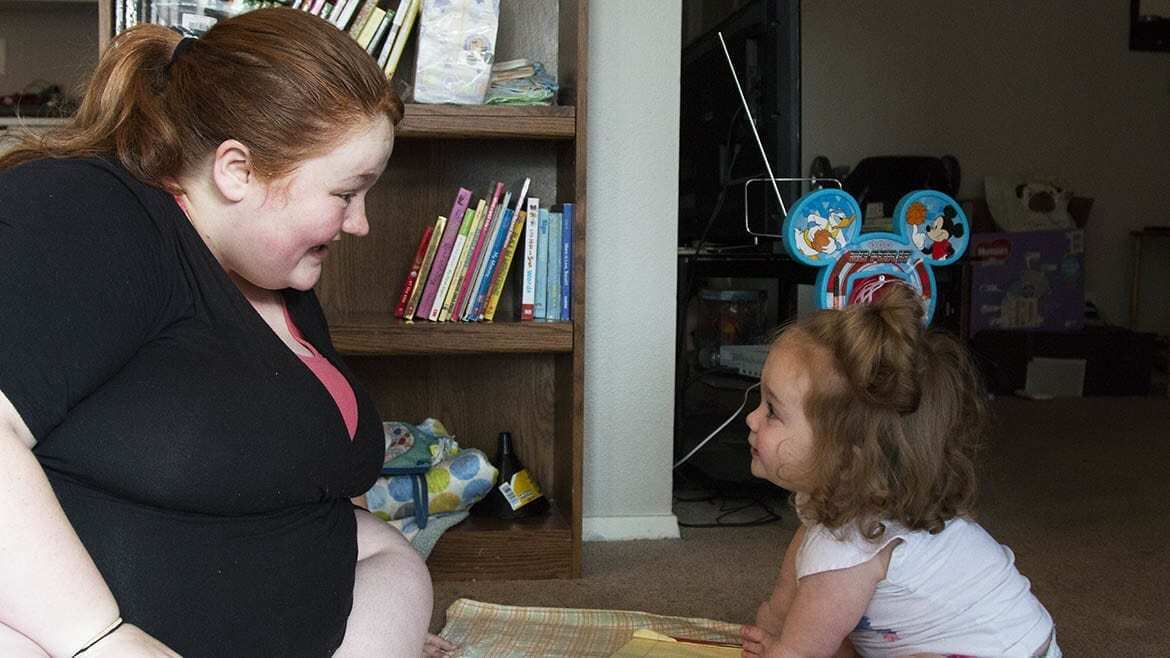 former foster care youth with her 19-month old daughter