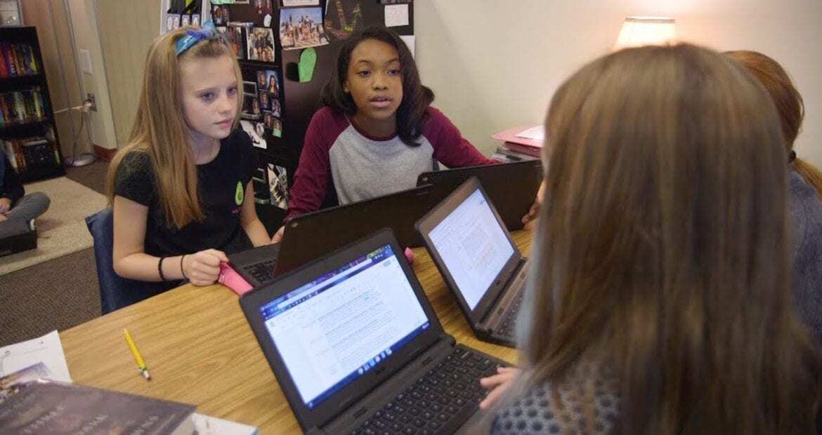 Students looking at a computer screen
