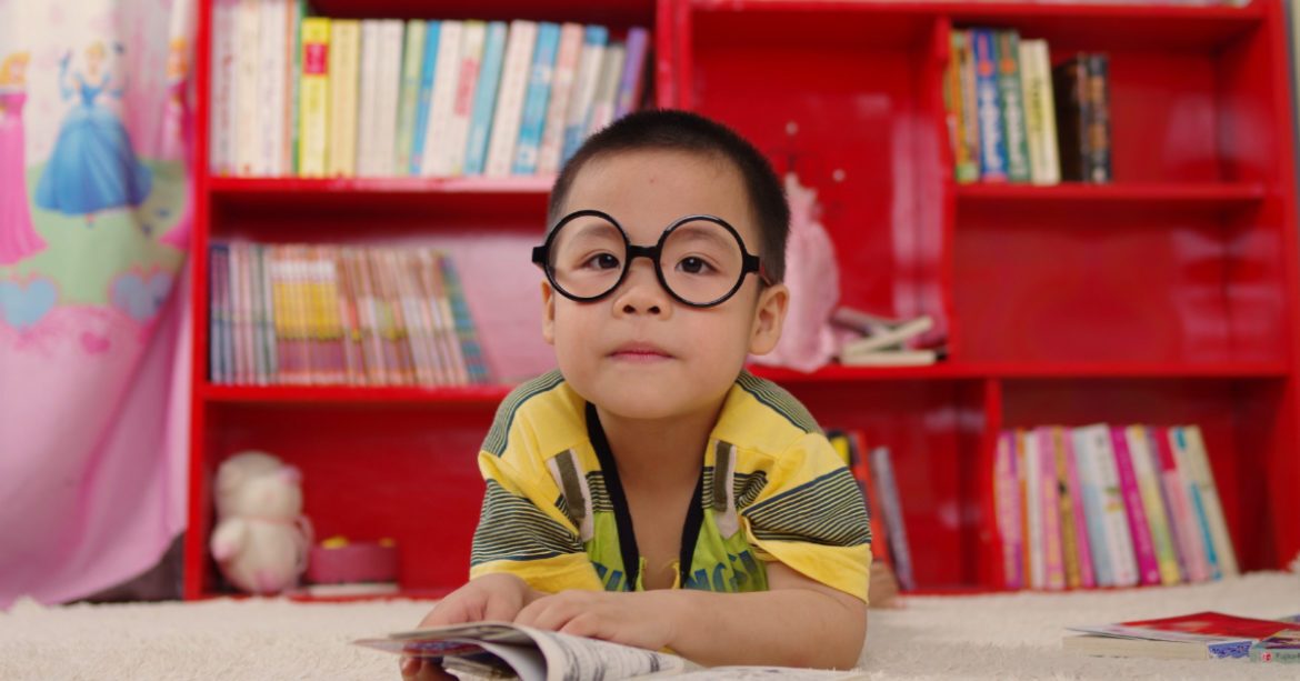 Kid reading a book