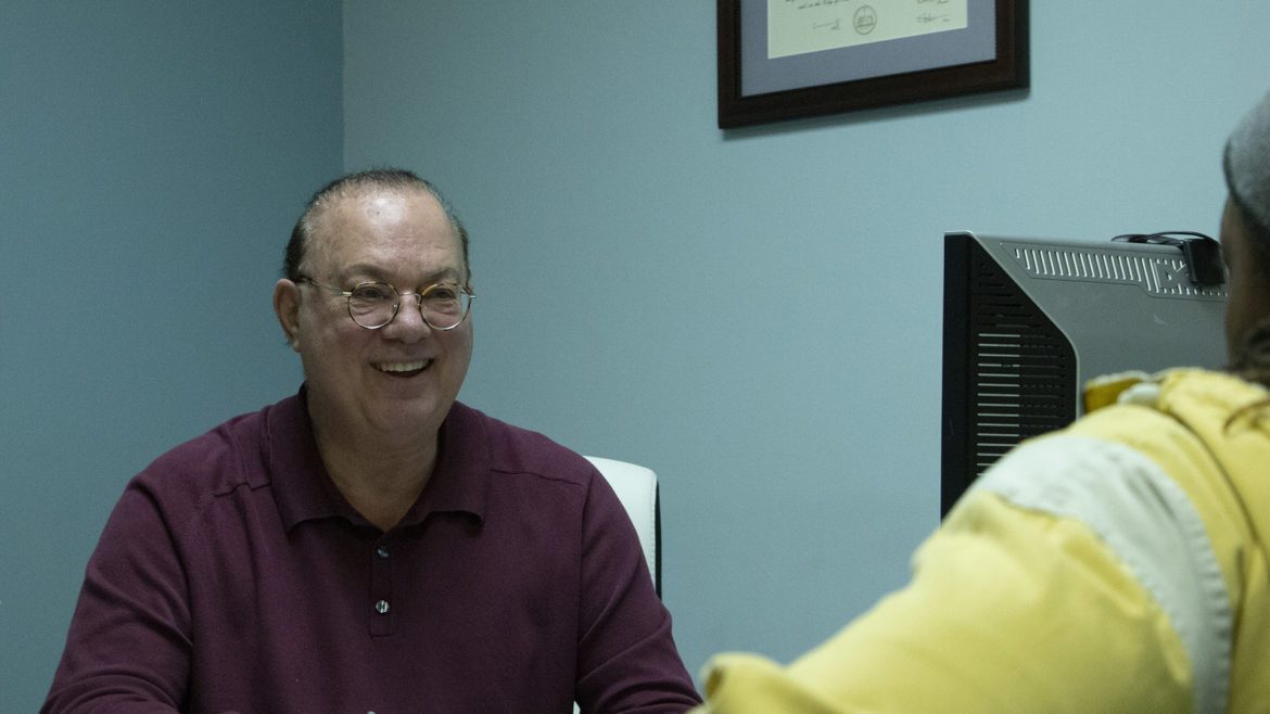 Dr. Poppa with patient Troy Hall