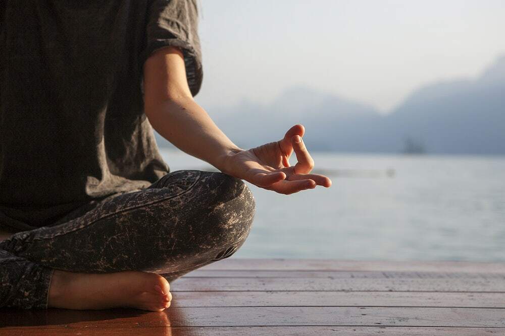 Meditation by a lake