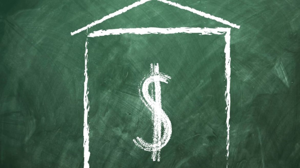 School house and a dollar sign on a chalkboard.