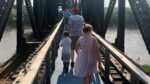 Mike Zeller leads a tour of the old Rock Island Bridge where he plans to create an entertainment district over the Kaw River.