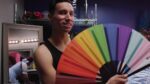 Person with rainbow fan