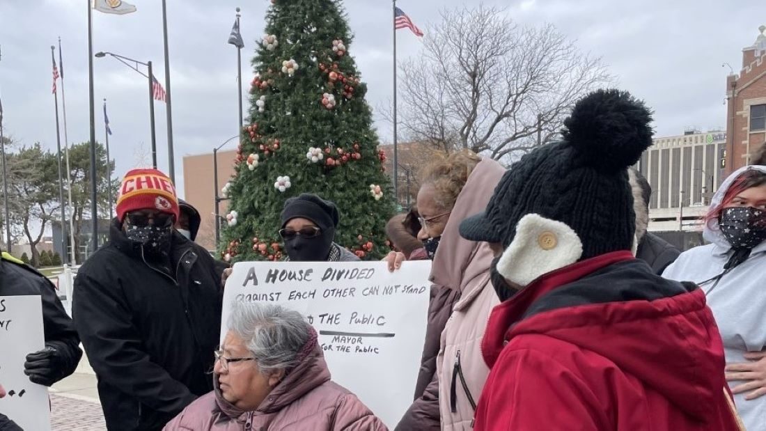 Protesters gathered outside of the offices of the United Government of Wyandotte County.