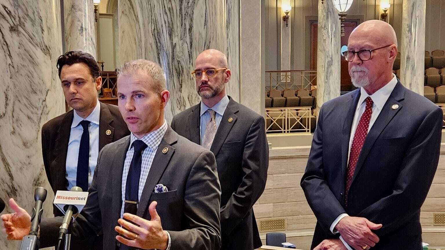 Sen. Rick Brattin, R-Harrisonville, was joined by, from left, Sens. John Rizzo, D-Independence, Greg Razer, D-Kansas City, and Mike Cierpiot, R-Lee's Summit, at a news conference to discuss a moratorium on landfill development in Kansas City last spring.