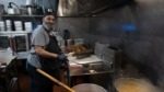 Chef/owner Abdul Hatimi of Yasmeen Cafe, located at 1447 Independence Ave., works in his kitchen recently for the lunch hour. (Todd Feeback | Flatland)