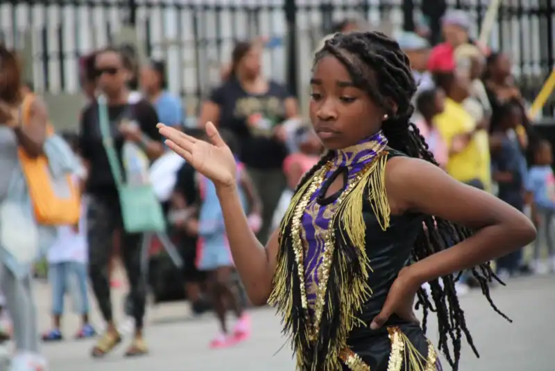 A Reign KC dancer performs at the at the JuneteenthKC Cultural Parade in the 18th and Vine District in 2022. (Bek Shackelford-Nwanganga | KCUR 89.3)