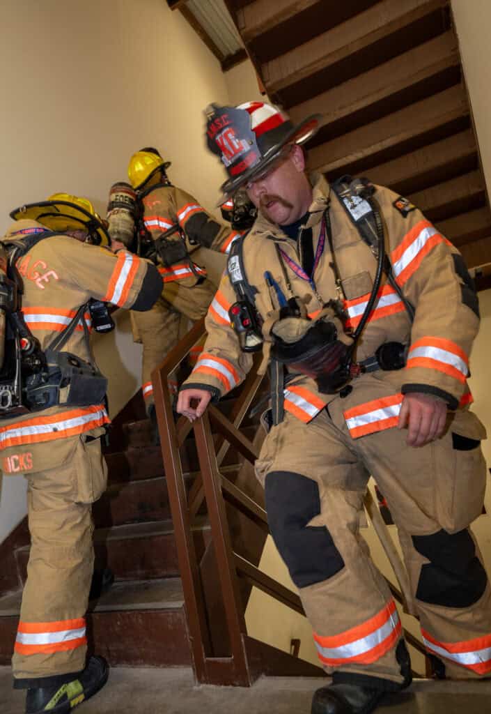Lucas Pilgrim, Fort Osage Fire Protection District, climbs another flight of stairs on Sept. 6, in honor of the 343 firefighters that lost their lives 25 years ago when the Twin Towers collapsed. (Todd Feeback | Flatland)