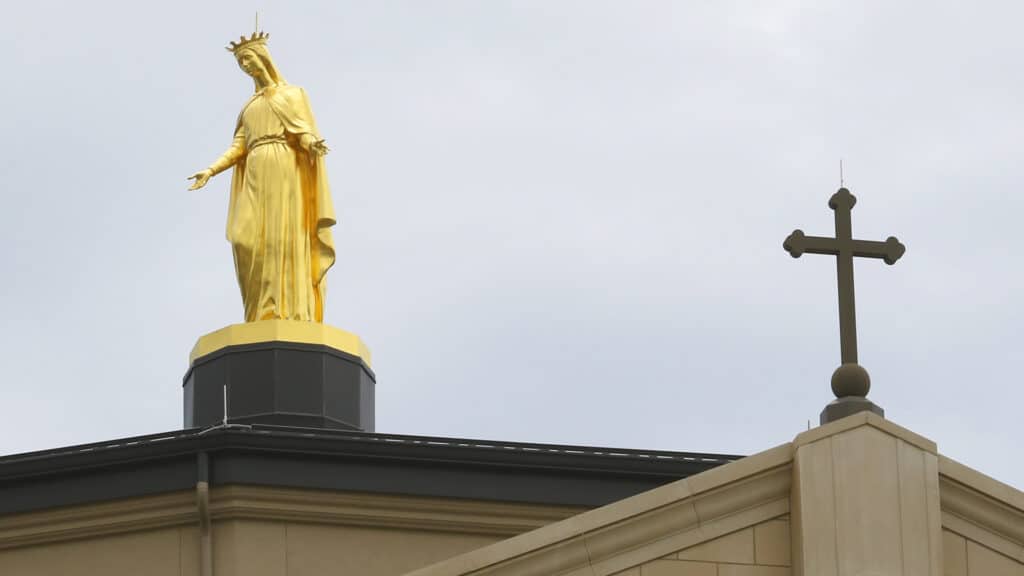 A Virgin Mary statue stands positioned at the top of the Immaculata in St. Marys, Kansas. The sect that built it, the Society of St. Pius X, has been excommunicated. (Photo by Thad Allton for Kansas Reflector)