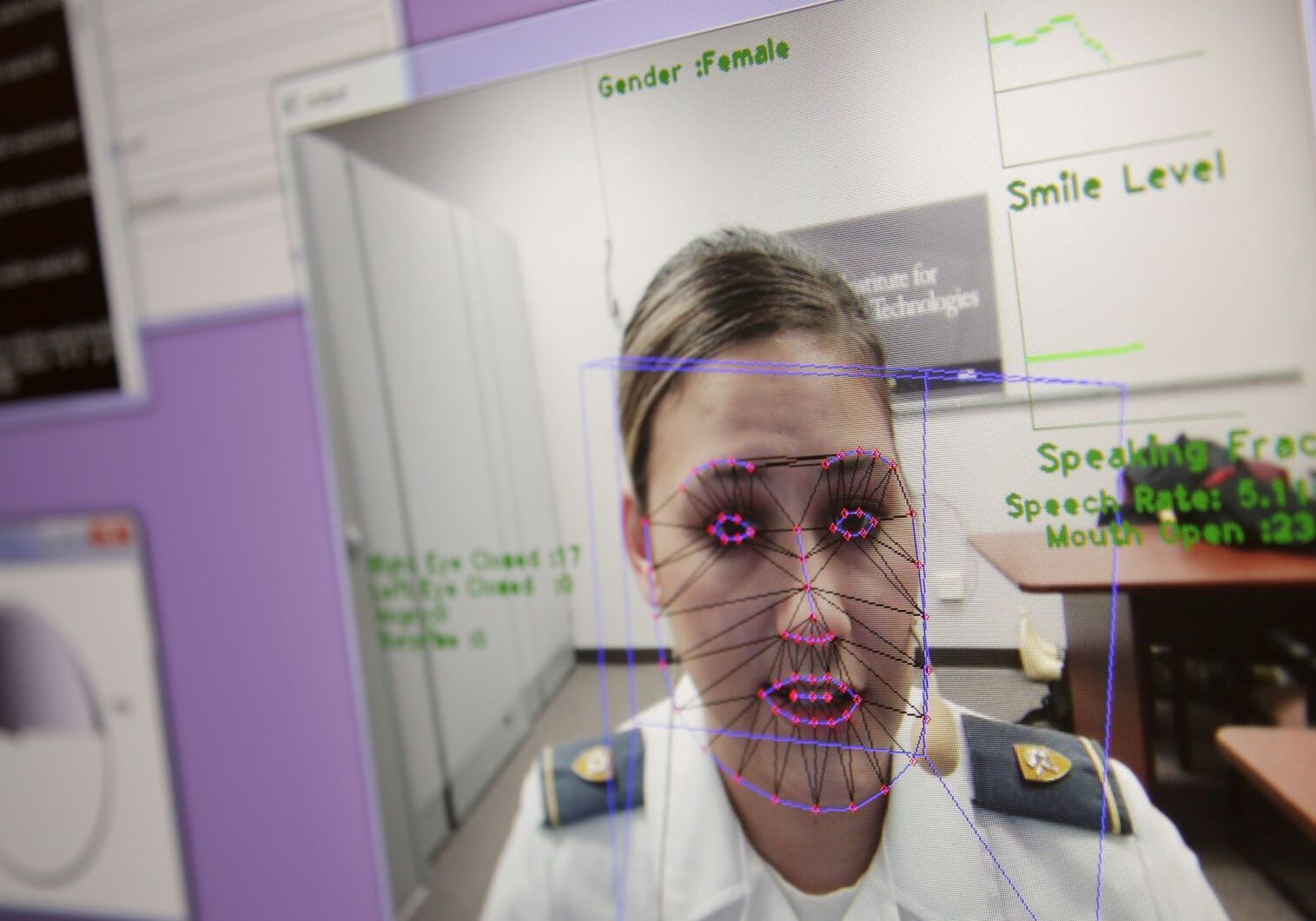 A computer monitors some of Cadet Cheyenne Quilter's reactions as she works with a virtual reality character named "Ellie" at the U.S. Military Academy at West Point, N.Y.
