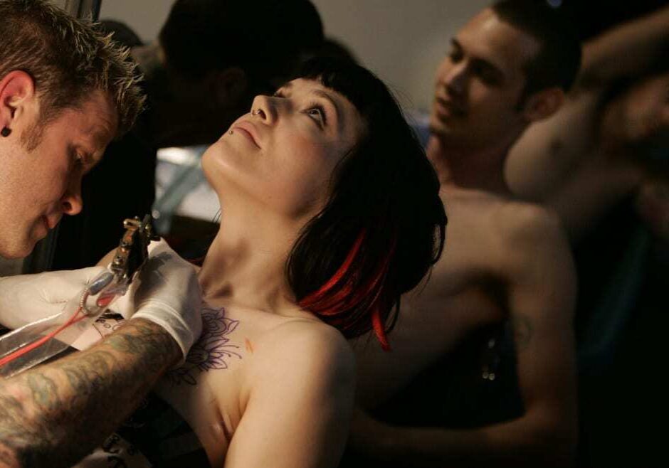 A woman getting a tattoo