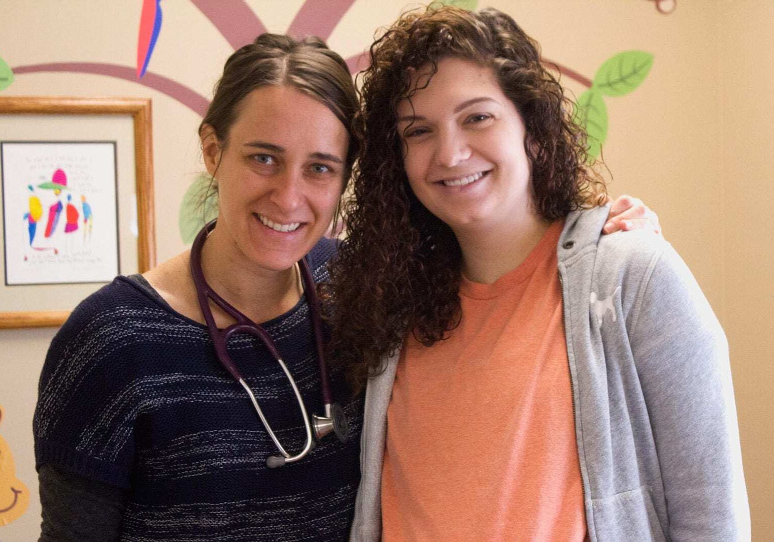 Certified Nurse Midwife Megan Sloat, left, has offered farm-to-clinic CSA shares to many of her pregnant patients, including Maris Bomgaars.
(Photo: Amy Mayer/Harvest Public Media)
