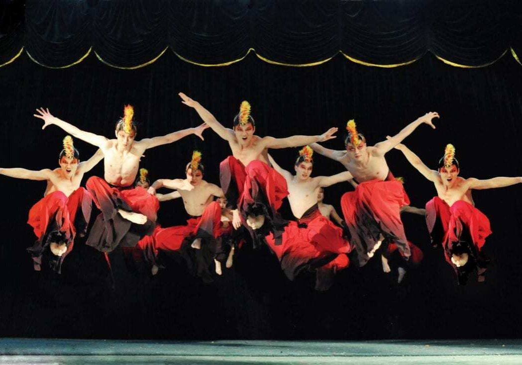 Acrobats jumping.