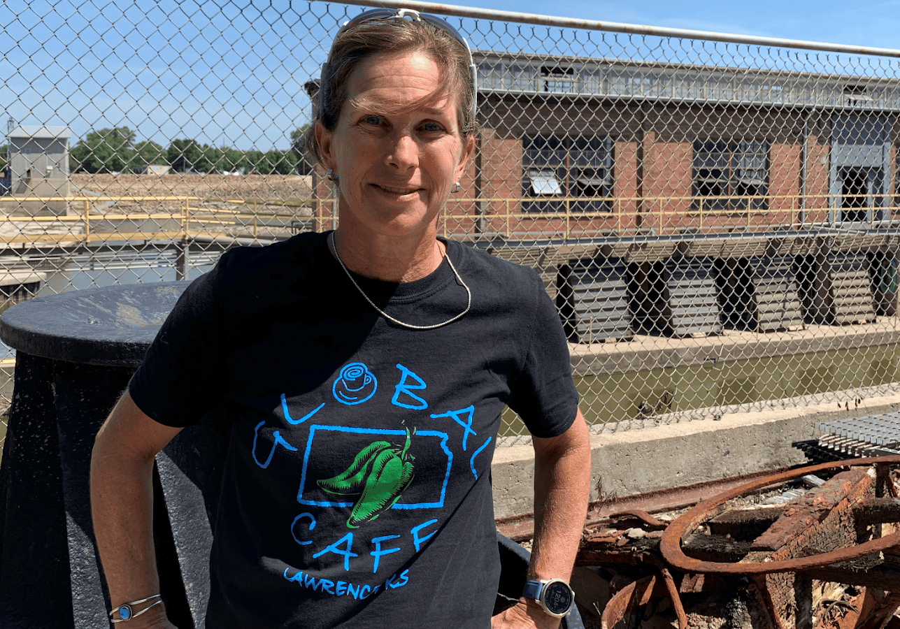 Sarah Hill-Nelson standing in front of Bowersock Mills & Power Co.’s hydroelectric plant.