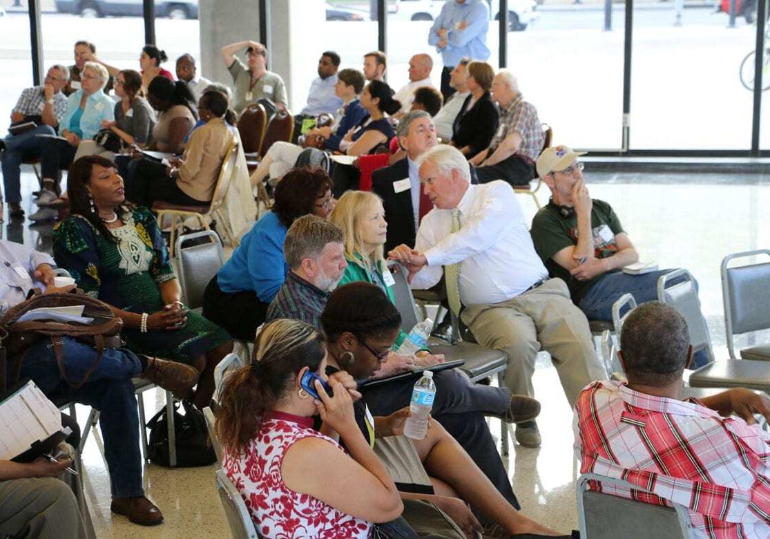 Attendees at a town hall held in Kansas City, Kan., Thursday evening broke into several small groups to discuss Mayor Mark Holland's idea for a healthy campus on the west edge of downtown. (Photo by Mike Sherry/The Hale Center for Journalism)