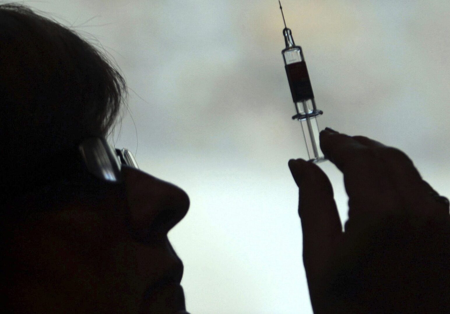 nurse with syringe