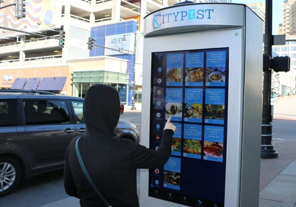 A person using a smart kiosk