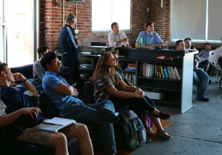 Participants at the Space Apps Challenge learn what their assignments will be for the weekend. 