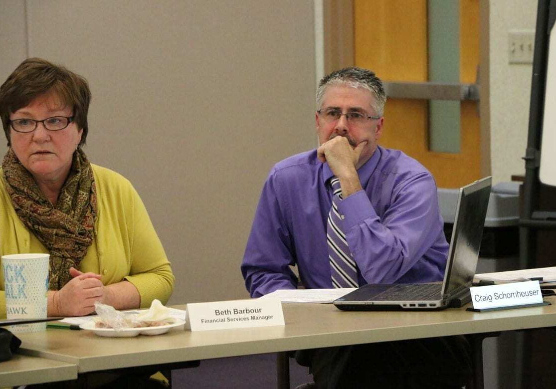 Budget officials at the center answer questions