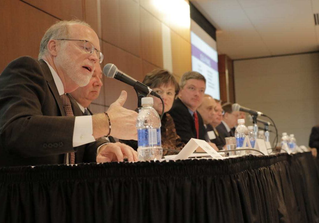 panelist makes a point at the forum